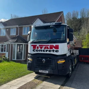 A Titan Concrete vehicle on-site at a residential construction project.